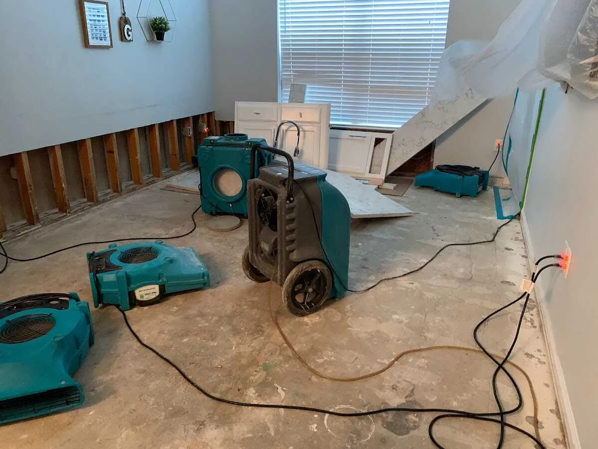 Dehumidifier in flood-cut room for Water Damage Restoration in Johns Creek